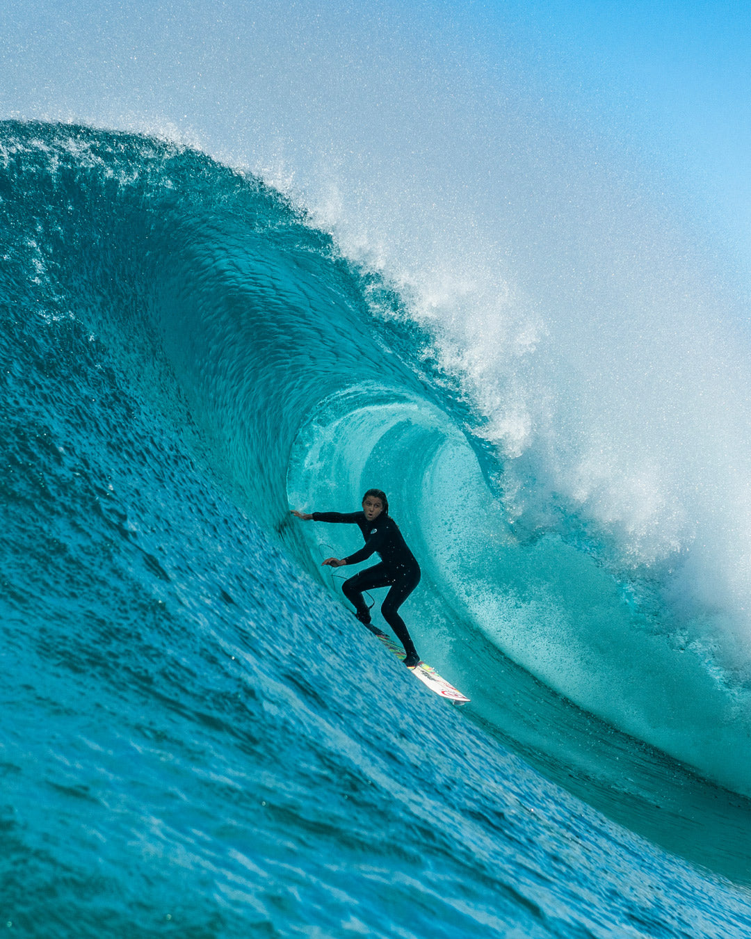 Molly Picklum on a big barrel