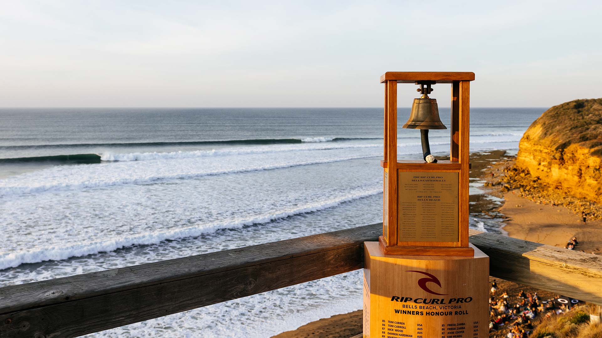 Bell on a stand with a scenic ocean view