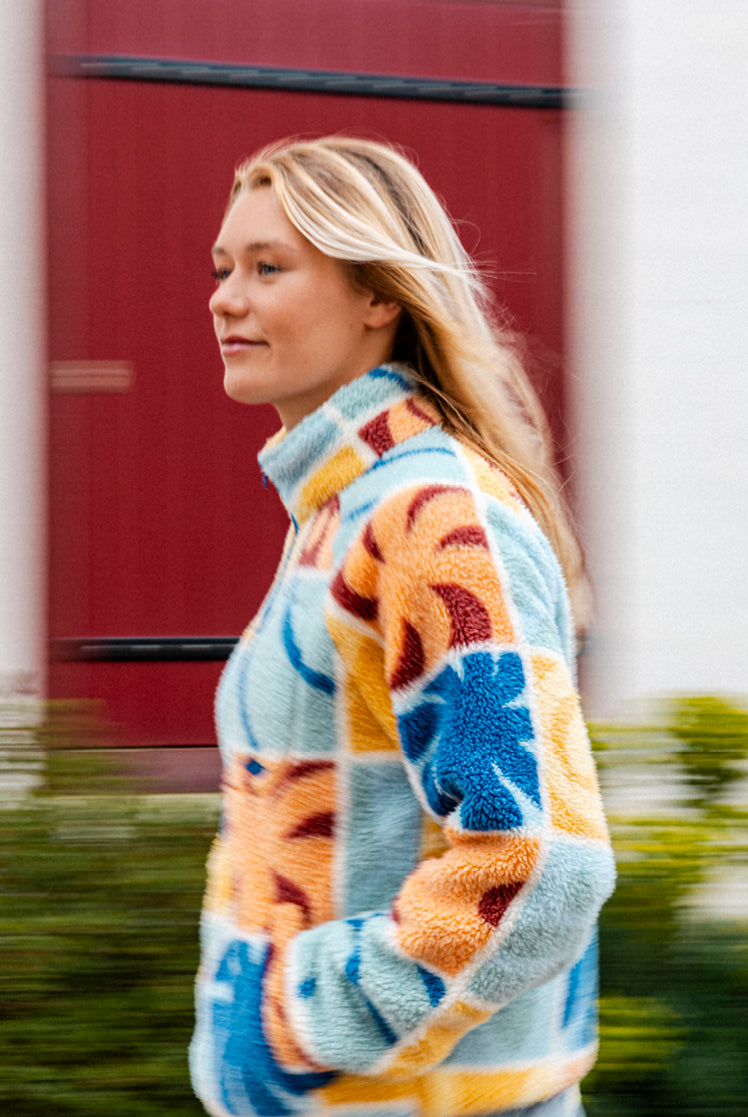 Woman wearing Ty Williams fleece
