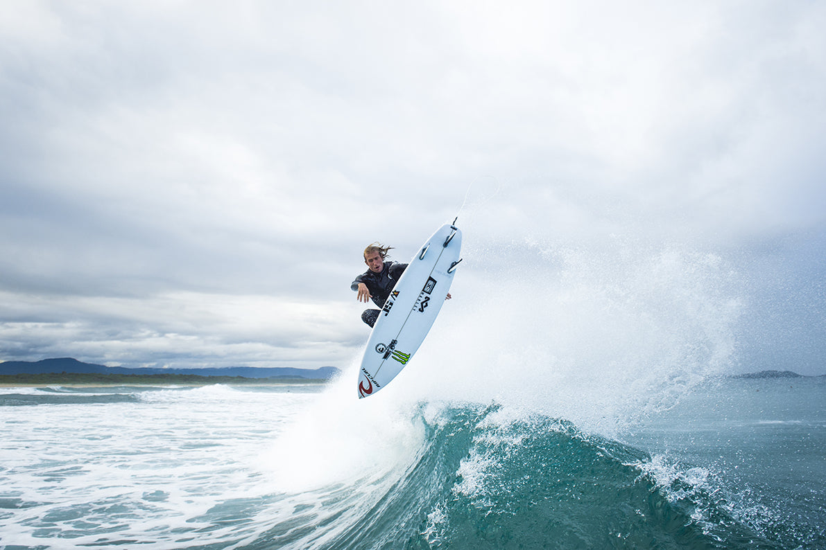Owen Wright doing an aerial surfing trick